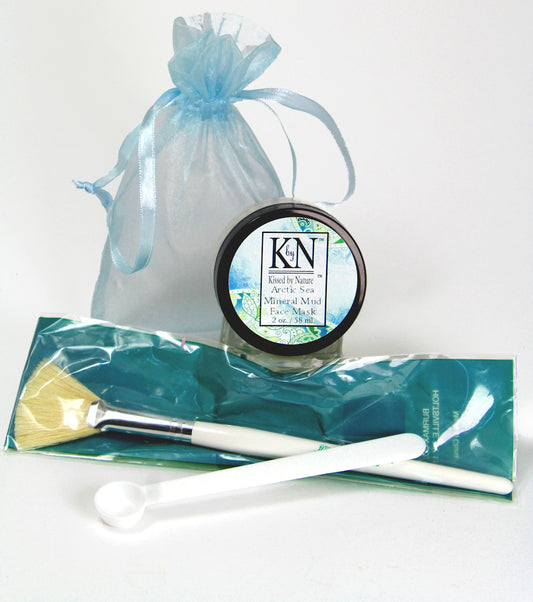 Mud face mask with brush